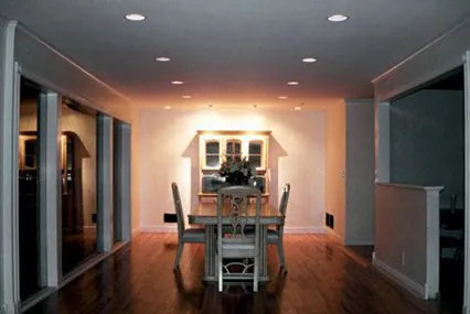 Recessed lighting installation in modern home